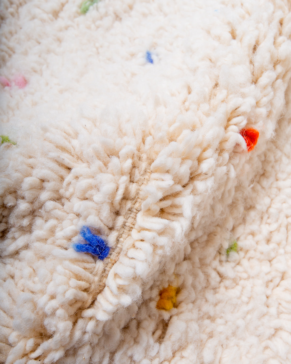 Modern, designer, handcrafted Berber rug from Morocco. Beniourain carpet with beautiful colours and patterns and fluffy wool texture.
